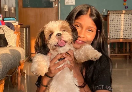 Happy pet parent with their dog